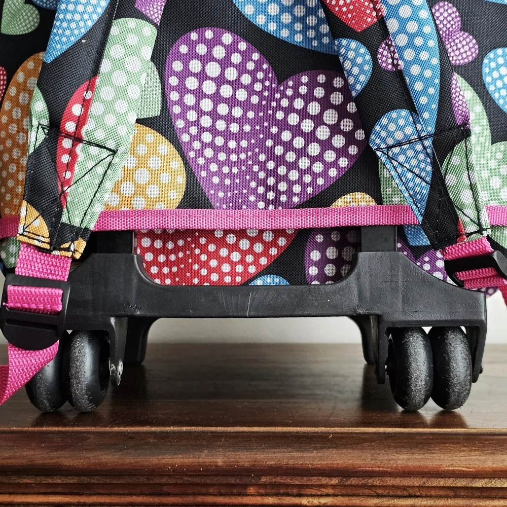 Rockland Rolling Backpack School Bag Travel Luggage Mesh Pockets New Heart 17″